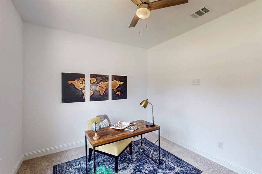 Office space featuring ceiling fan and carpet floors