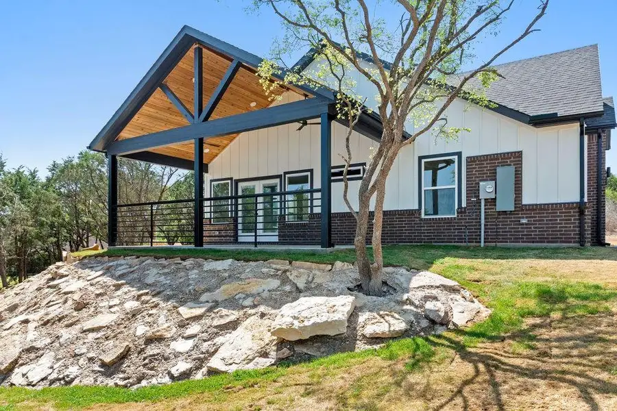 Exterior details and patio area of a home in , Granbury (Image 4).