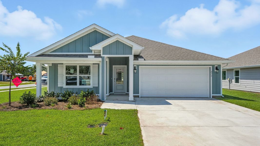 Front exterior of a new home in Palmetto Bluff, Port Saint Joe, FL, highlighting curb appeal (Image 1). Front exterior of a new home in Palmetto Bluff, Port Saint Joe, FL, highlighting curb appeal (Image 1).