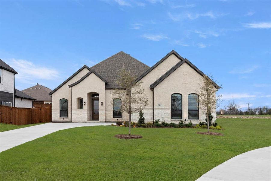 Front exterior of a new home in Nelson Lake Estates, Rockwall, TX, highlighting curb appeal (Image 2). Front exterior of a new home in Nelson Lake Estates, Rockwall, TX, highlighting curb appeal (Image 2).