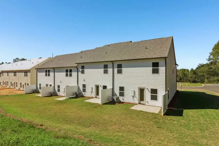 Representative Photo: Townhome Building Rear Exterior Representative Photo: Townhome Building Rear Exterior