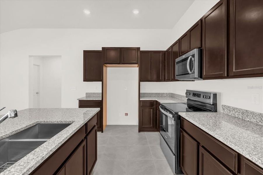 Furnished interior view inside a new home in Robins Run, Lake Wales (Image 9).