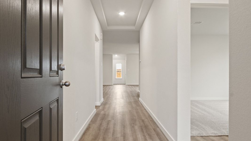 Representative furnished interior of a home built from the Driskill by Brightland Homes in Sunterra, Katy (Image 4).