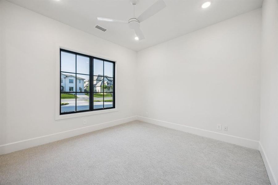 Carpeted spare room with recessed lighting and a ceiling fan Carpeted spare room with recessed lighting and a ceiling fan