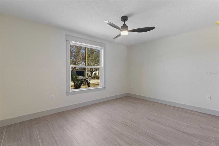 Spacious, unfurnished interior of a new home in , Port Charlotte (Image 24).