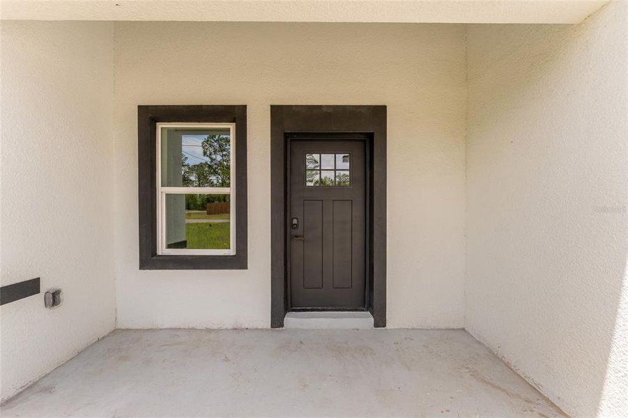 Exterior details and patio area of a home in , Citrus Springs (Image 17).