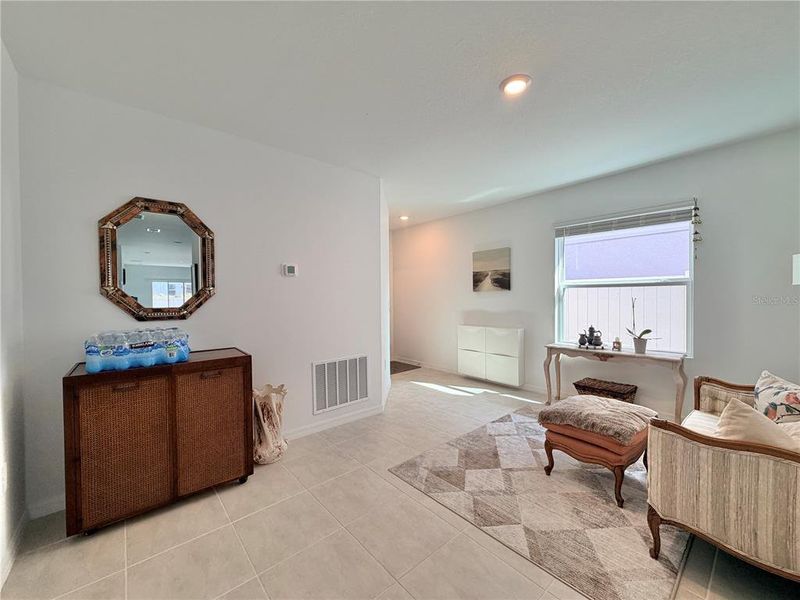 Furnished interior view inside a new home in Westview Community Group Page, Kissimmee (Image 7).