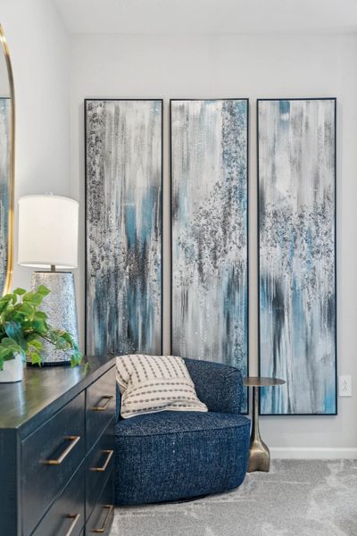 A blue chair in a room.