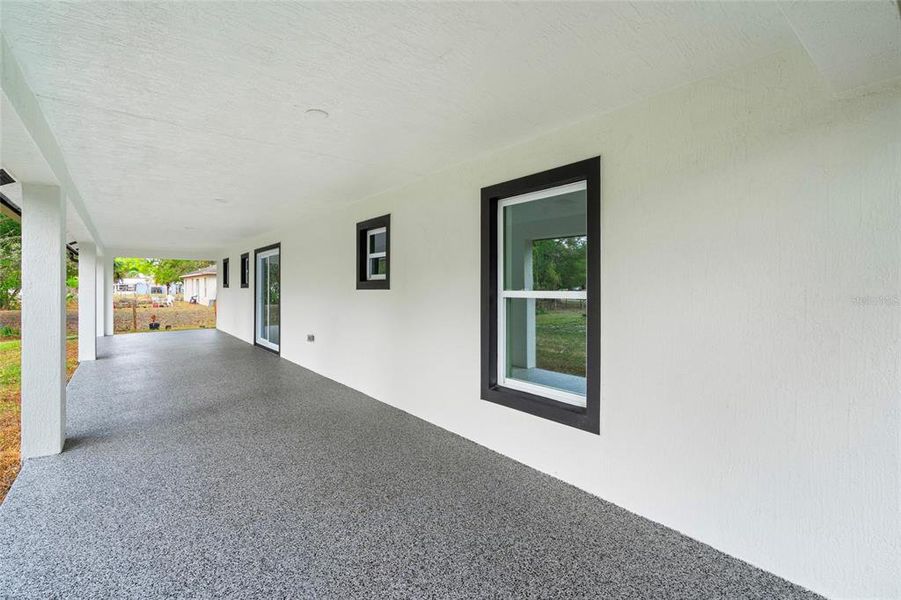 Exterior details and patio area of a home in , Okeechobee (Image 24).