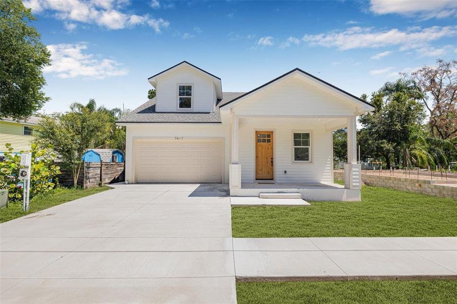 Front exterior of a new home in , Tampa, FL, highlighting curb appeal (Image 2). Front exterior of a new home in , Tampa, FL, highlighting curb appeal (Image 2).