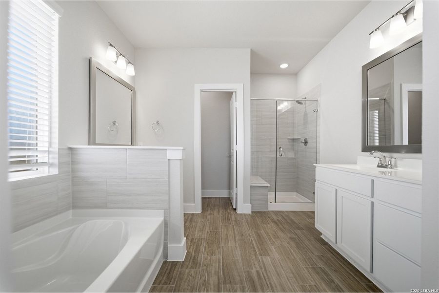 Furnished interior view inside a new home in The Woodlands at Medina Hills, Mico (Image 16).