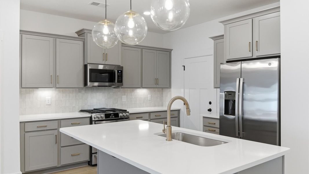 Furnished interior view inside a new home in Village at Midway, Anderson (Image 12).