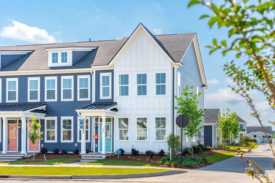 Front exterior of a new home in Townhomes at Nexton, Summerville, SC, highlighting curb appeal (Image 18). Front exterior of a new home in Townhomes at Nexton, Summerville, SC, highlighting curb appeal (Image 18).