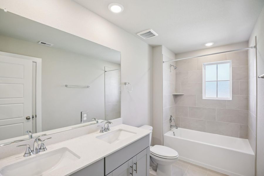 Furnished interior view inside a new home in Stewart's Ranch, Conroe (Image 12).