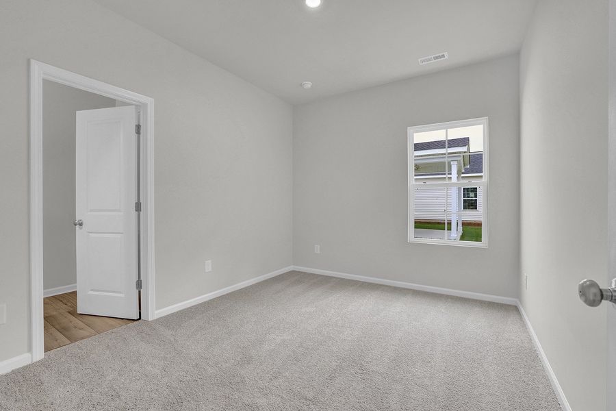 Spacious, unfurnished interior of a new home in River Tide Farms, Bolivia (Image 21).