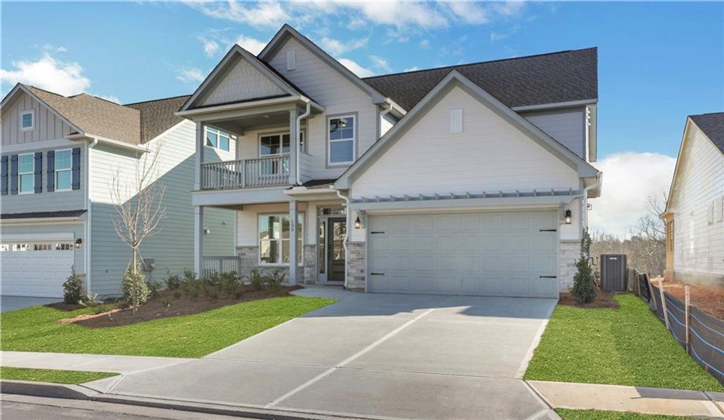 Front exterior of a new home in Twin Lakes, Hoschton, GA, highlighting curb appeal (Image 2).