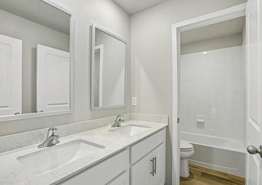 The secondary bathrooms have a tub/shower combo.