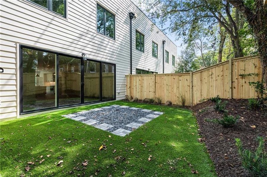 Exterior details and patio area of a home in The Berkeleys, Atlanta (Image 25).