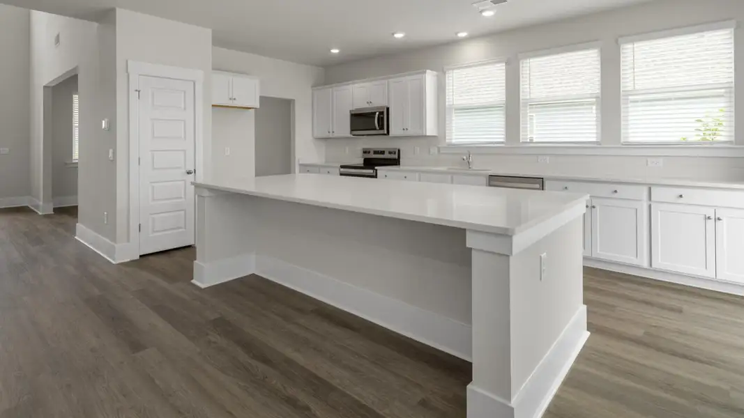 Furnished interior view inside a new home in The Highlands at Cedar Hill Landing, Navassa (Image 8).