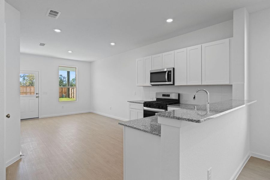 Furnished interior view inside a new home in Crosby Farms, Crosby (Image 7).