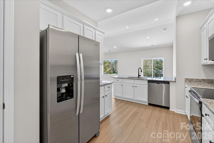 Furnished interior view inside a new home in Stagecoach Station, Gastonia (Image 5).