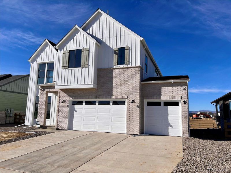 Front exterior of a new home in , Fort Collins, CO, highlighting curb appeal (Image 3).