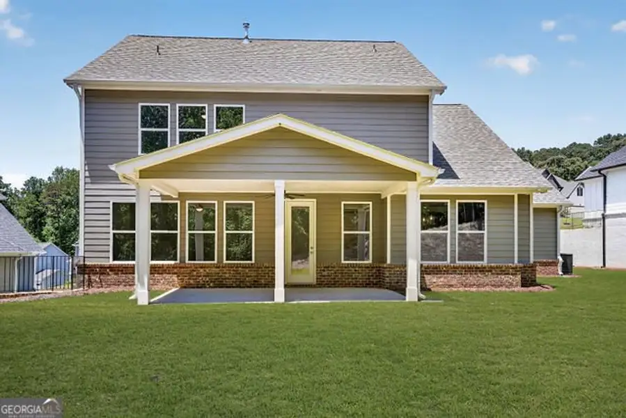 Exterior details and patio area of a home in The Manor at Gainesville Township, Gainesville (Image 4).