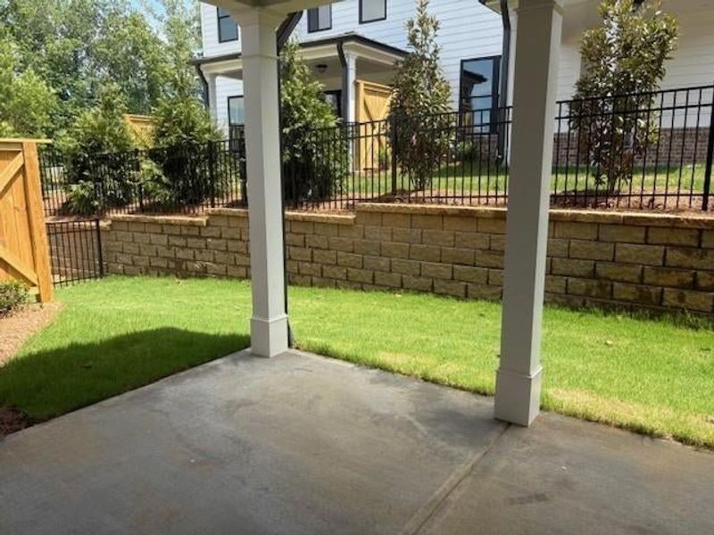 Backyard - fenced in with gate - great space. Pictures represent a previously built home, not the actual home.