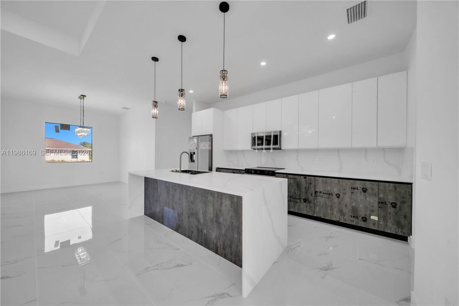 Furnished interior view inside a new home in , Lehigh Acres (Image 4). Furnished interior view inside a new home in , Lehigh Acres (Image 4).