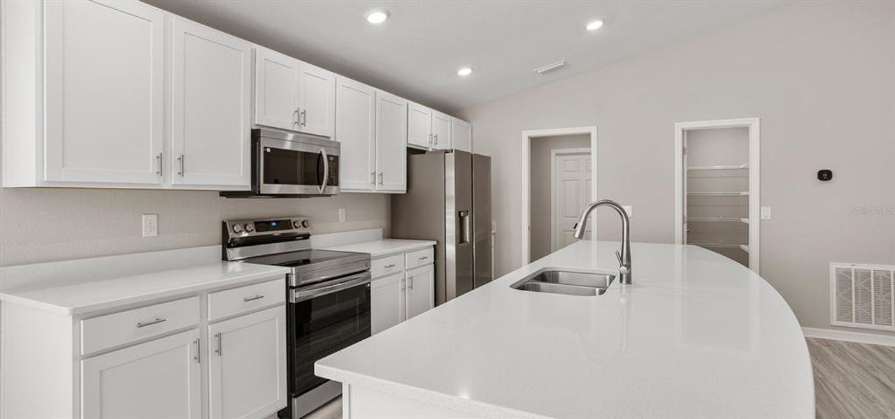 Furnished interior view inside a new home in Bennah Oaks, Belleview (Image 5).
