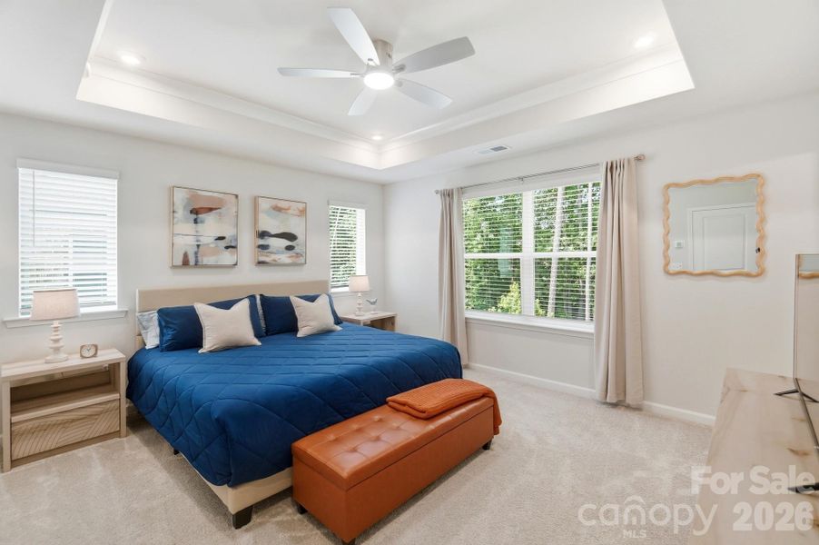 Primary Suite with tray ceiling and cove crown molding!
