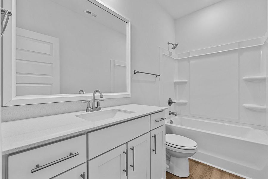 Furnished interior view inside a new home in Brayden, Advance (Image 11).