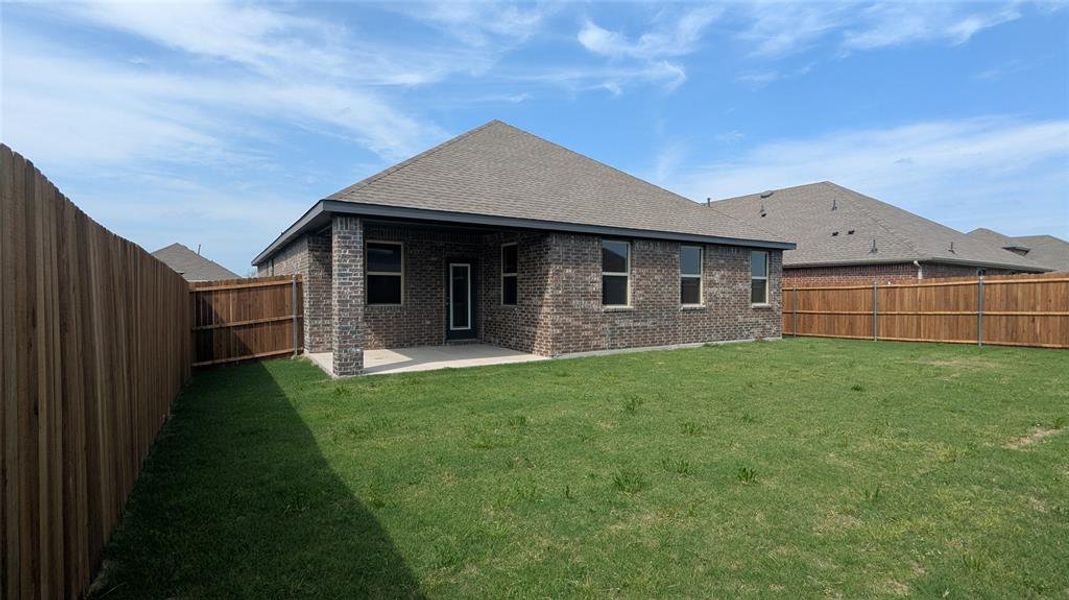Exterior details and patio area of a home in Trailstone, Caddo Mills (Image 1).