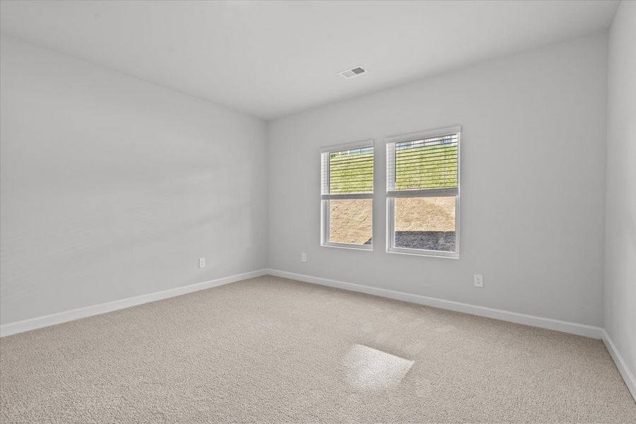 Spacious, unfurnished interior of a new home in The Farm at Wells Creek - Signature Collection, Gray Court (Image 20).