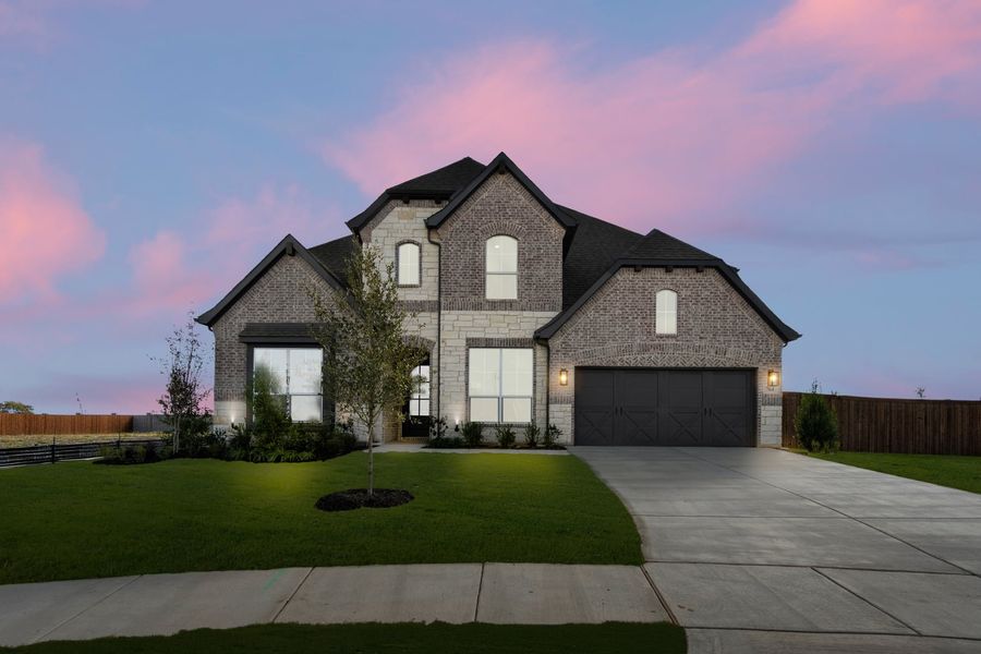 Front exterior of a new home in Myrtle Creek, Waxahachie, TX, highlighting curb appeal (Image 1). Front exterior of a new home in Myrtle Creek, Waxahachie, TX, highlighting curb appeal (Image 1).
