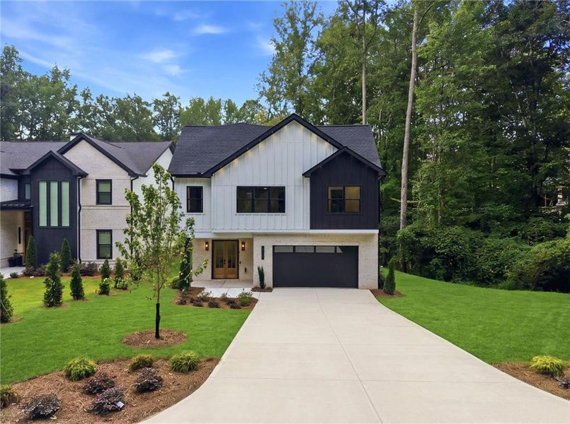 Front exterior of a new home in , Sugar Hill, GA, highlighting curb appeal (Image 26).
