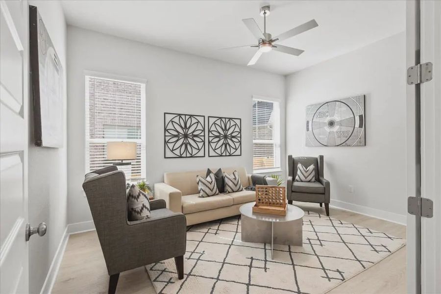 Representative furnished interior of a home built from the Draco by Chesmar Homes in The Grove at Blackhawk, Pflugerville (Image 5).