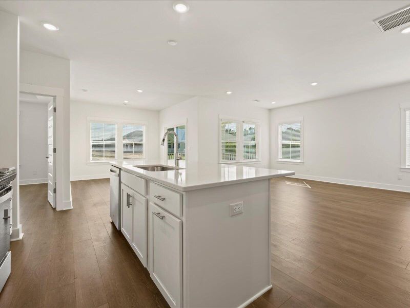 Furnished interior view inside a new home in The Coves at Lakes of Cane Bay, Summerville (Image 8). Furnished interior view inside a new home in The Coves at Lakes of Cane Bay, Summerville (Image 8).