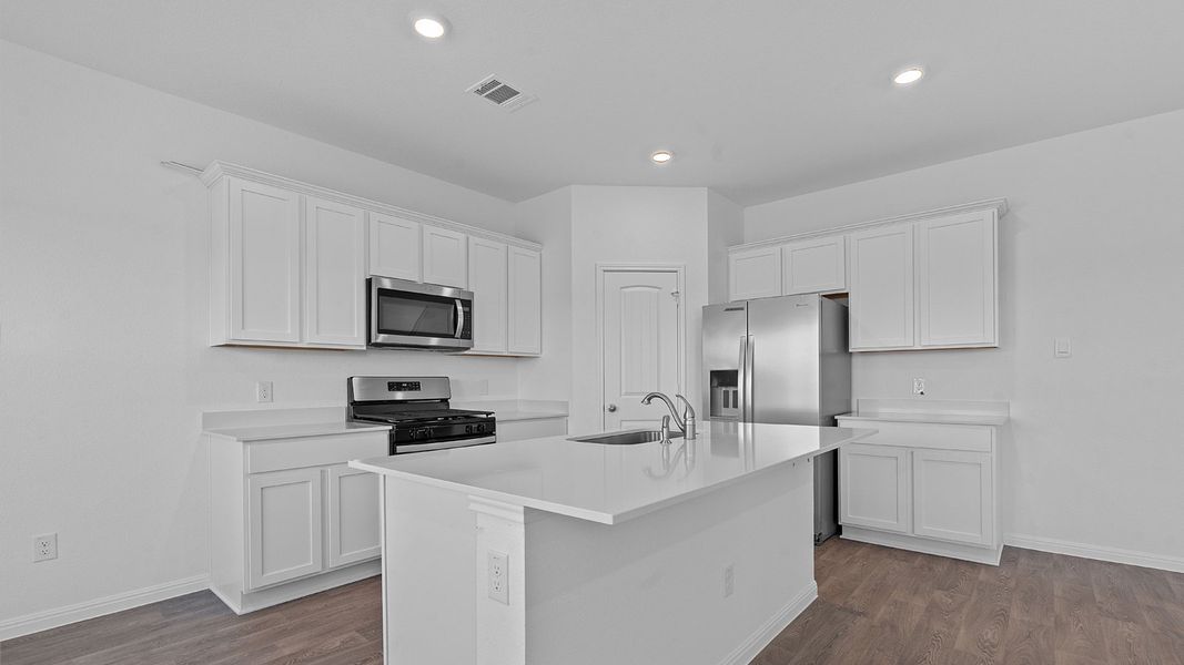 Furnished interior view inside a new home in Carillon, Manor (Image 3).