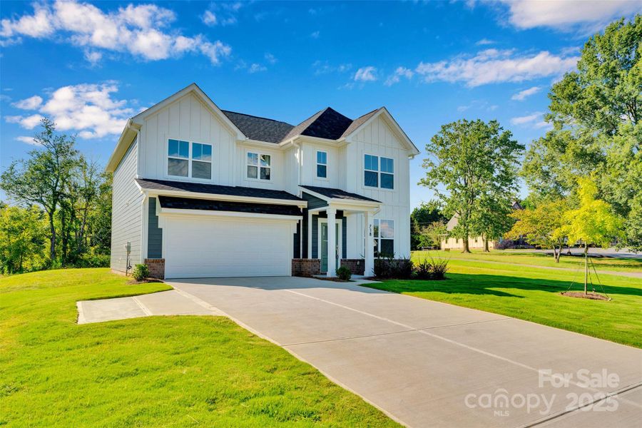 Front exterior of a new home in , Lincolnton, NC, highlighting curb appeal (Image 22).