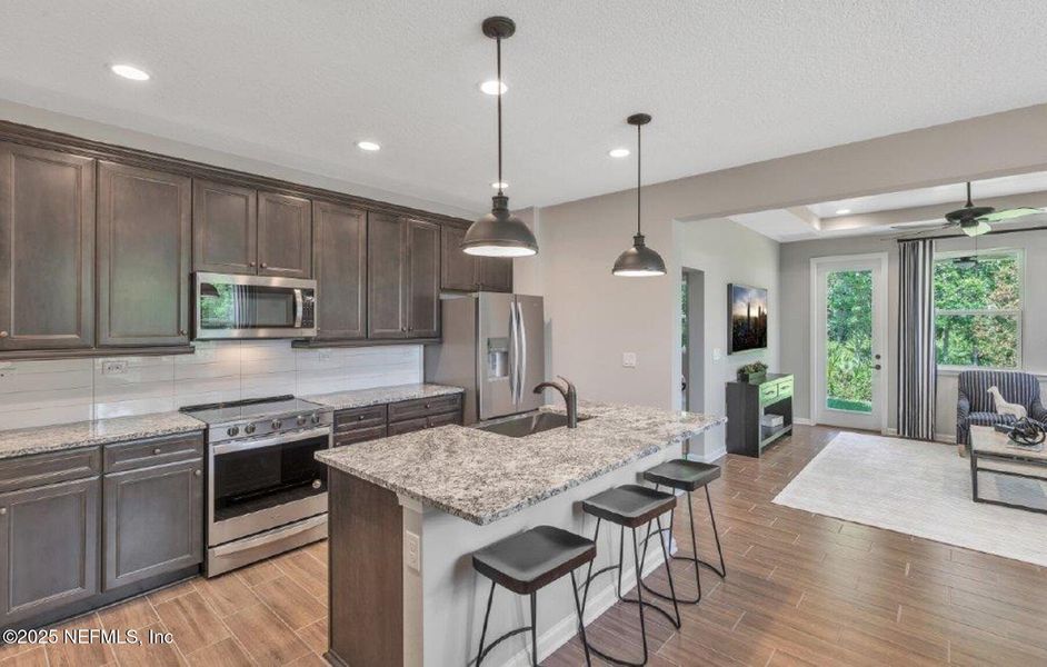 Furnished interior view inside a new home in Brook Forest - Single Family Homes, St. Augustine (Image 4).
