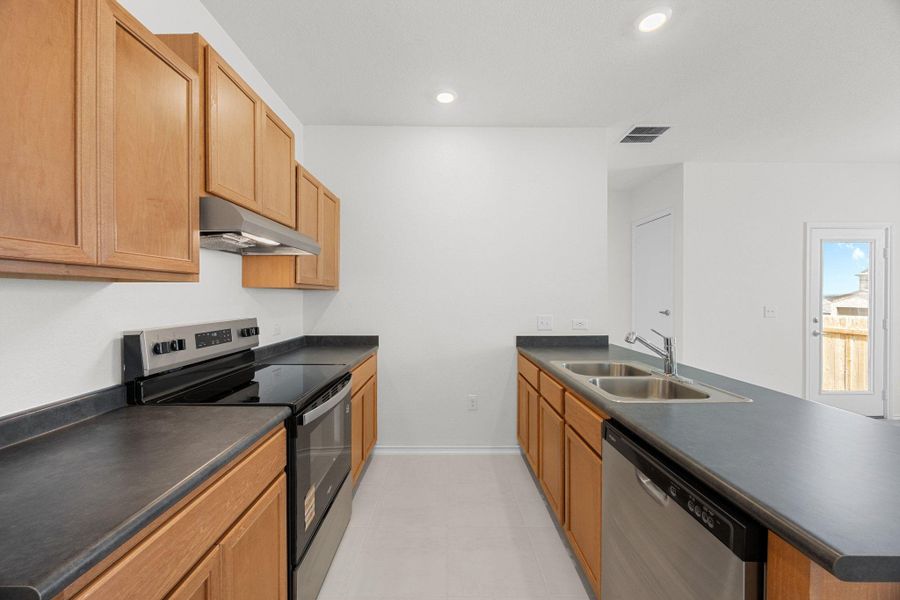 Furnished interior view inside a new home in Creekside at Estancia, Austin (Image 7).