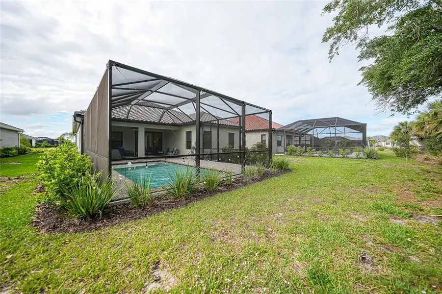 Exterior details and patio area of a home in , Englewood (Image 25).