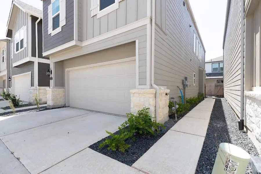 Exterior details and patio area of a home in , Houston (Image 28). Exterior details and patio area of a home in , Houston (Image 28).