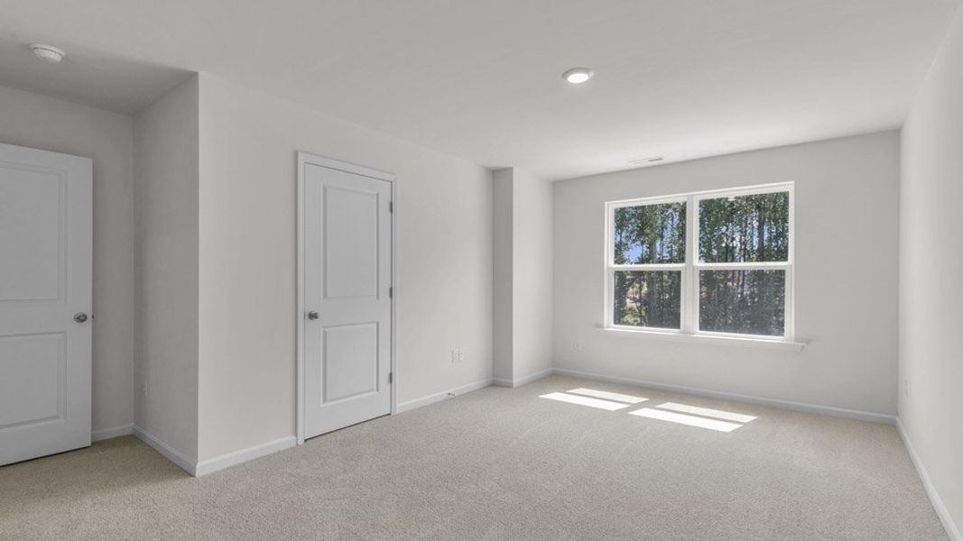 Spacious, unfurnished interior of a new home in The Townes at Bexford, Willow Spring (Image 15). Spacious, unfurnished interior of a new home in The Townes at Bexford, Willow Spring (Image 15).