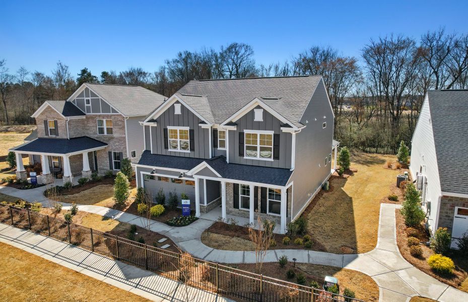 Front exterior of a new home in Riverstone, Monroe, NC, highlighting curb appeal (Image 25).