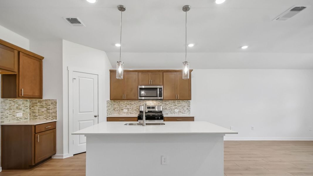 Furnished interior view inside a new home in Trails at Wildhorse, Austin (Image 7).