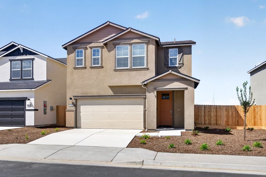 A house with a garage. A house with a garage.