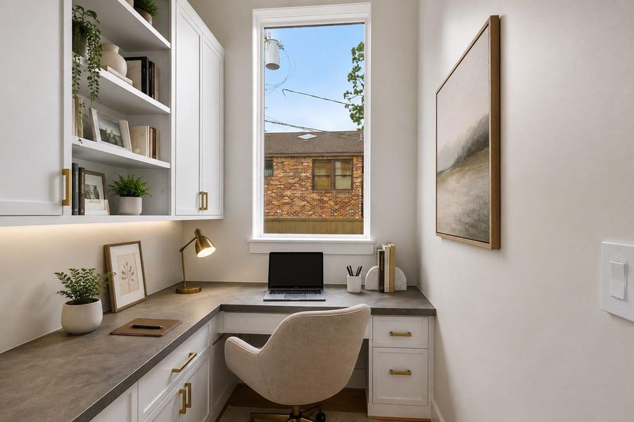 Off the kitchen...This thoughtfully designed home office maximizes every inch of space with custom built-in cabinetry, expansive work surfaces, and abundant storage, creating an environment that is both beautiful and highly functional. Bathed in natural light - it offers the perfect setting for working from home or as a central study hall with style and efficiency.  Virtually staged to illustrate furnishing possibilities