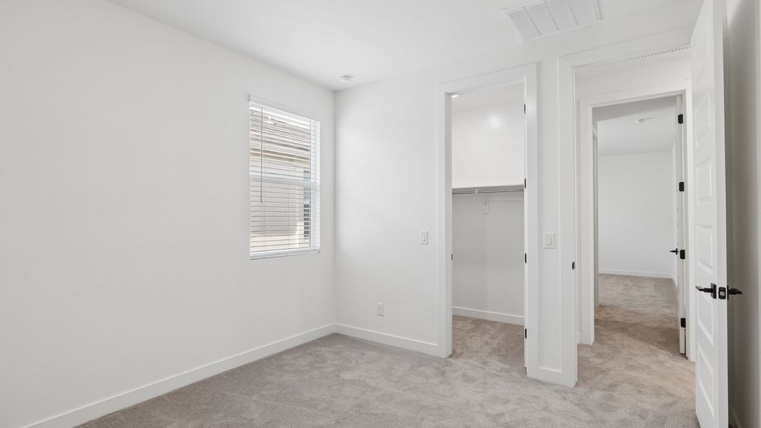 Representative unfurnished interior of a home built from the Phoenician by D.R. Horton in The Ridge at Stone Butte, Phoenix (Image 40).